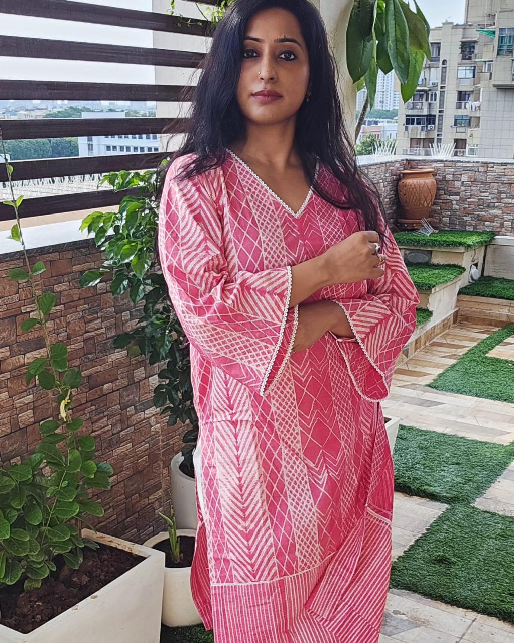 A Pink Shibori kurta with intricate tie-dye patterns and a relaxed fit.