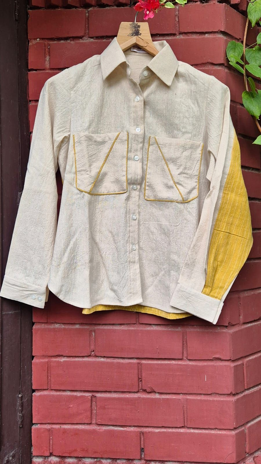A beautiful women wear shirt with a yellow back and cream front. its a very smart 2 coloured shirt in premium cotton 